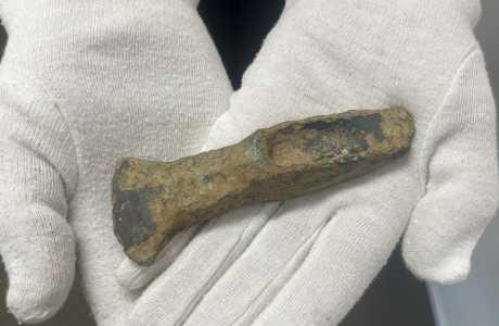 Palstave Axe in gloved hands